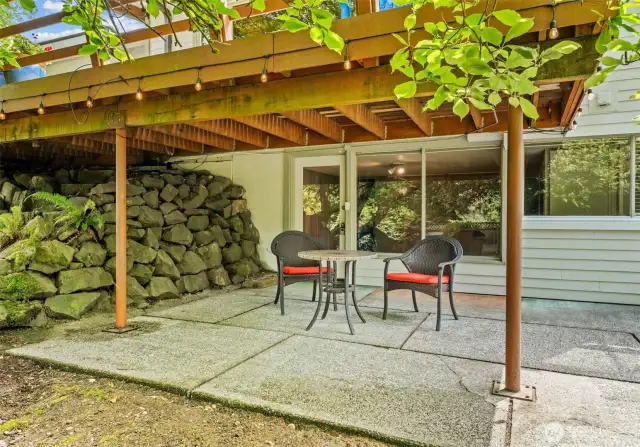 The primary suite is located in the lower level and has a coverd patio.
