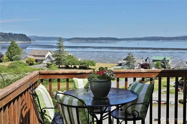 Sit on your deck to enjoy sunrise and sunsets! Plus, huge water and mountain views too!