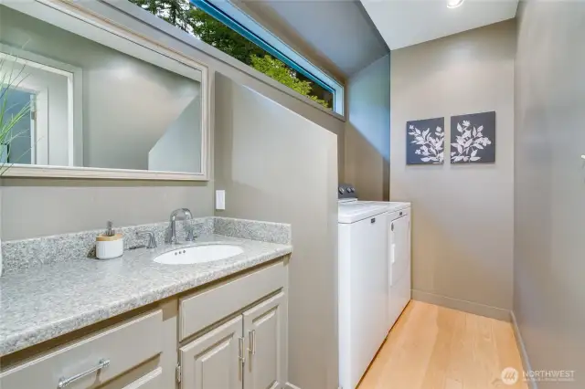 Hall bath with laundry.