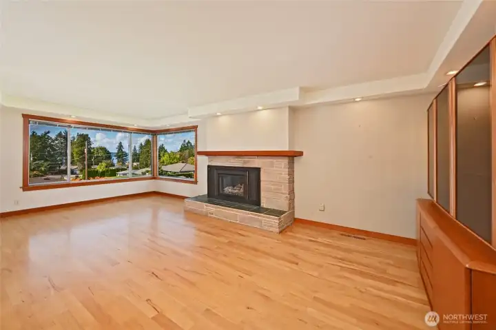 Gorgeous hardwoods, gas fireplace and beautiful views await!