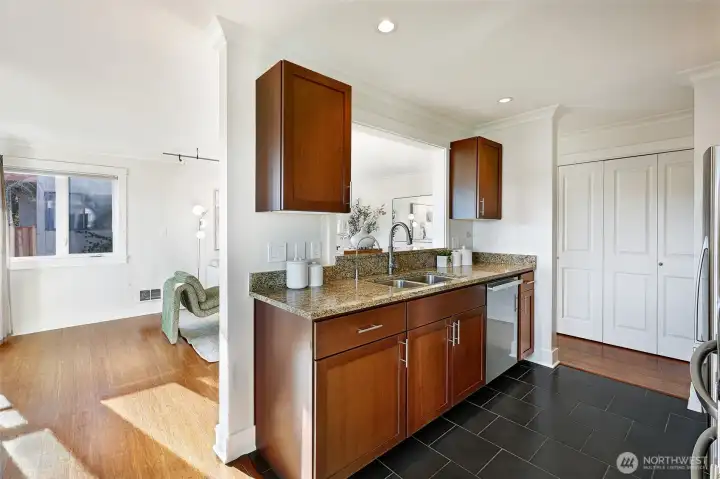 Kitchen pass shelf can also be a bar eating area.