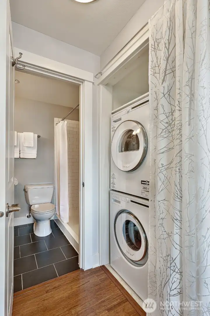 Primary bedroom bath and laundry.