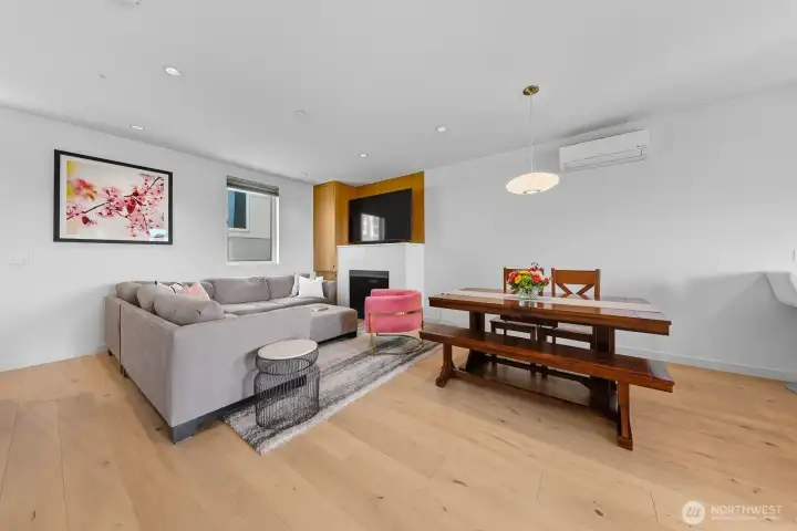 Great room includes living room with gas fireplace.