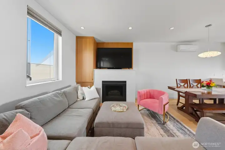 Great built-ins around charming fireplace.