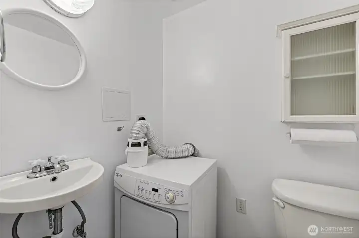 Guest bathroom and laundry room designed for everyday ease