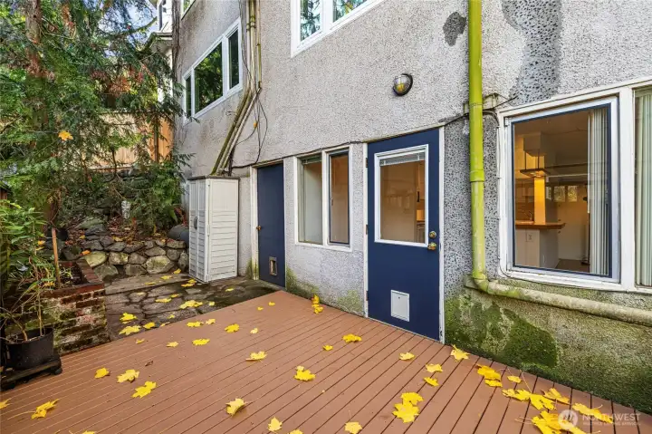 Deck features two garden planters, ideal for urban gardening.