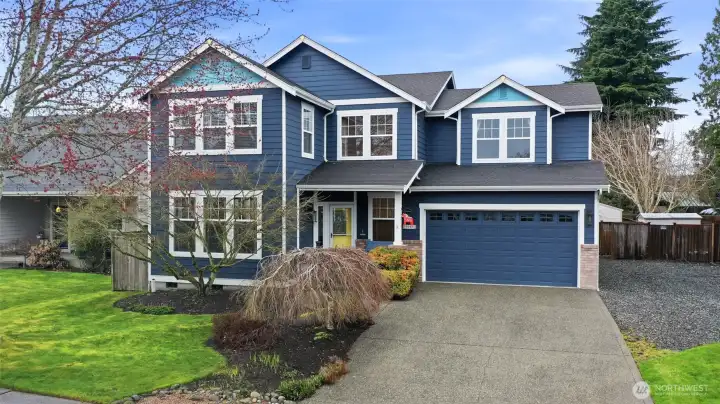 Beautiful 2-story home with ample parking in a wonderful neighborhood. With mature trees and lovely landscaping you will fall in love with this location!