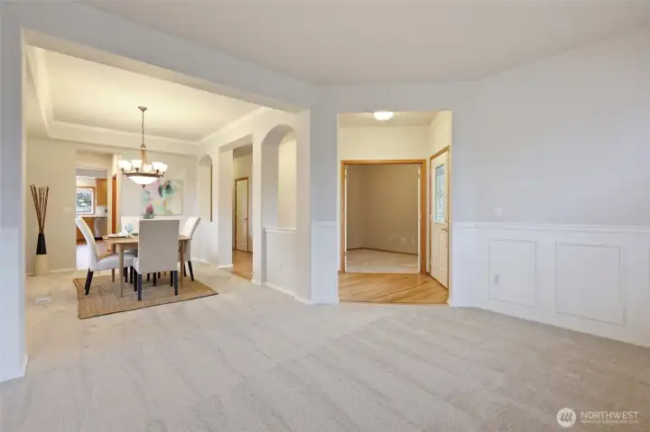 A spacious family room, perfect sitting room, or whatever you need! Straight ahead you will find the home office.