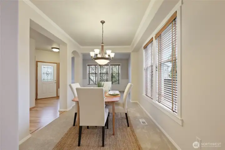 Beautiful formal dining room with plenty of space for everyone! Turn around and find the butler's pantry leading to the kitchen.