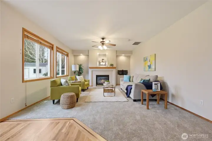 Fabulous living room with gas fireplace and mantle. TV wall mount included as well!