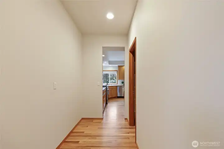 Spacious butler's pantry area! Furnish this room to suit your needs! Coffee bar, cocktail bar, additional storage, the list goes on! Door on right is the walk-in pantry.