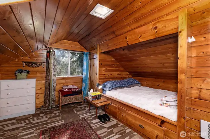Upstairs bedroom with built in bed. Look at that woodwork!