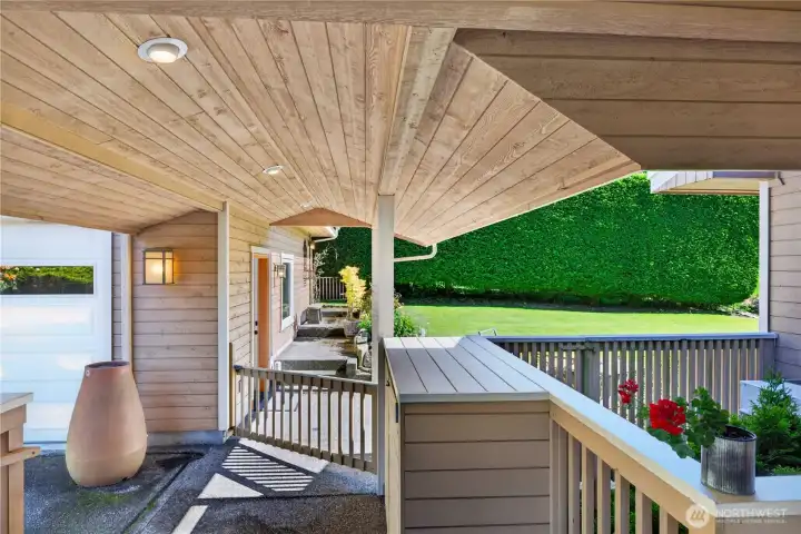 Pathway leading to stairs to access the guest suite above the garage.