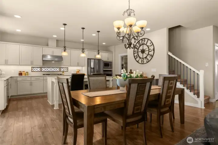 The all-occasion dining room is perfectly situated between kitchen and great room, creating a central area for meals and gatherings