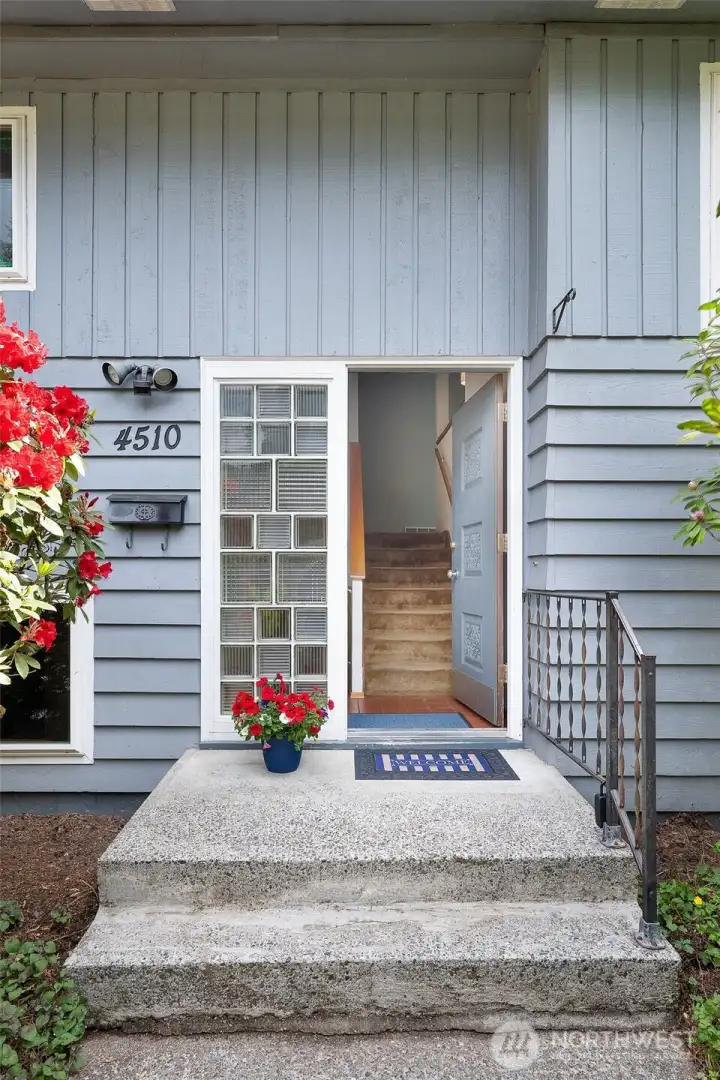Welcoming front entry. Custom glass block sidelight creates a beautiful focal point, brightening the entry while providing privacy