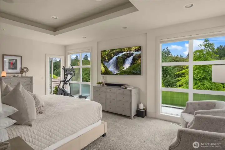 Primary with room with floor to ceiling windows and private terrace