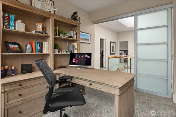 Office on 3rd storry.Thoughtful touches like pocket shoji door room dividers allow the space to open up or close off with effortless elegance.