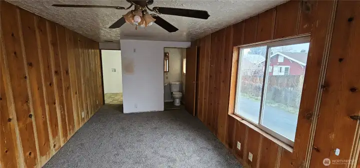 Main level bedroom with 1/2 bath Main level bedroom with 1/2 bath