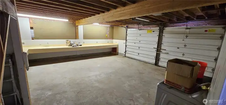 Garage with lots of workbench space and light Garage with lots of workbench space and light