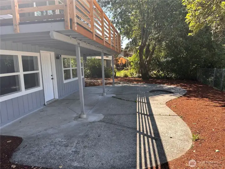 Great patio area off the basement with a fire pit Great patio area off the basement with a fire pit