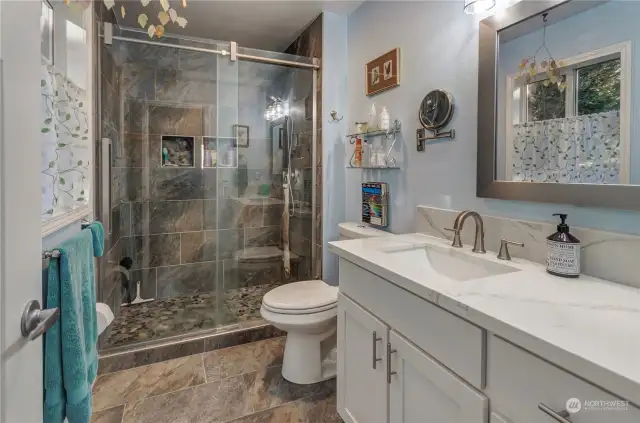 Fully Remodeled Bath With Walk-in Shower Is Off The Primary Bedroom.