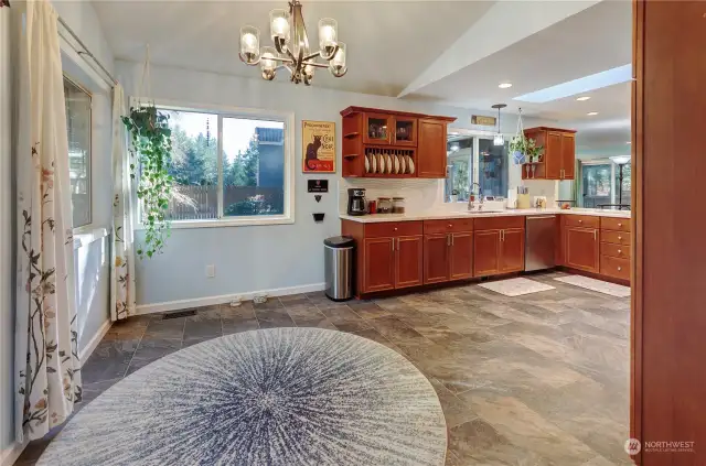 Dining Room Space And Beautiful Tile Floor Into Kitchen.