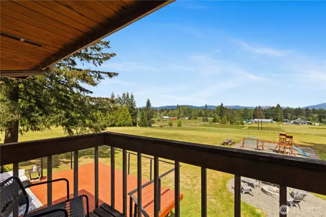 Primary bedroom private mountain view deck
