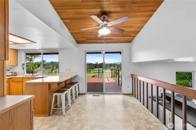 Space off kitchen for breakfast nook, leads to east facing deck