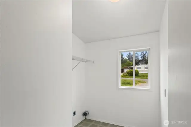 The utility room is conveniently located near the bedrooms to make life easy! Note the additional storage in here, too.