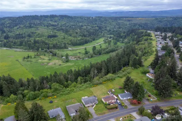 On clear days, Mount Rainier shines from almost every room in this one-level home. They say, 'Live Like the Mountain Is Out' and here that's a natural way of life!