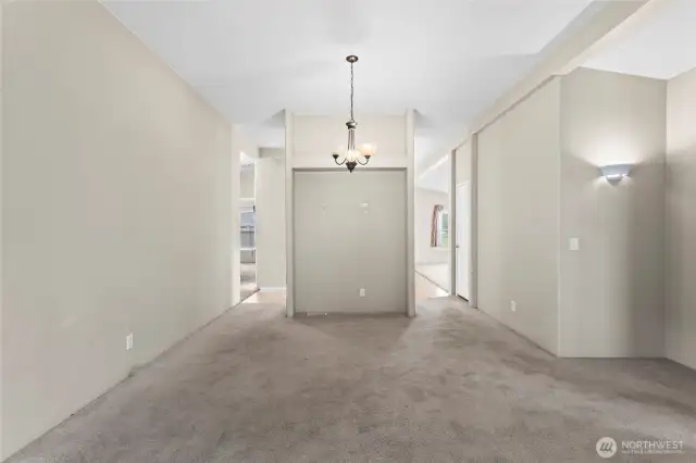 Easy flow through the formal dining space right into the kitchen and family room.
