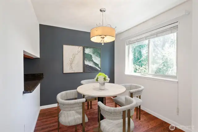 Dining area is virtually staged