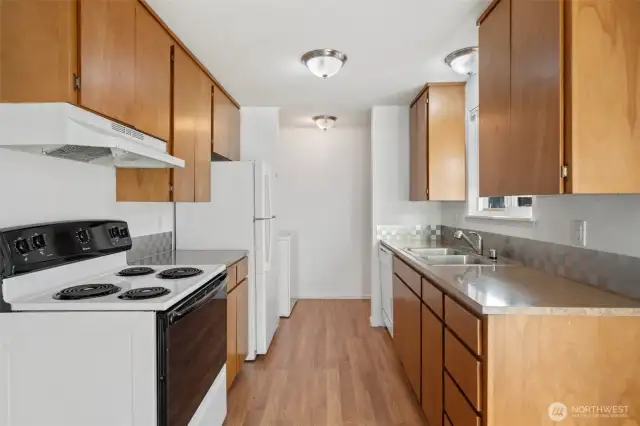 On the other side of the kitchen is the area for the washer & dryer