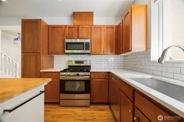 Another view of the kitchen with the 4 burner gas range.