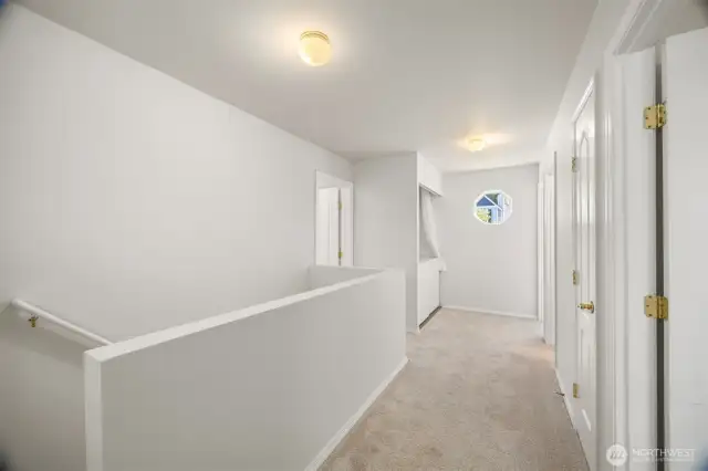 The laundry room is just by the octagonal window on the 2nd floor with all the bedrooms.