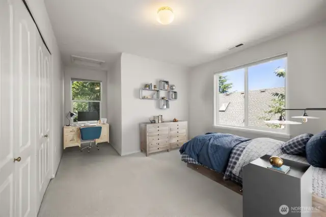 Another bedroom has two dormer alcoves.