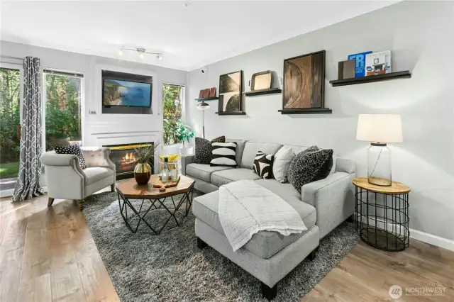Welcome to Sundance at Klahanie - a charming, updated, one-bedroom condo that checks all the boxes. Convenience meets comfort, with accessible parking right outside your single-level condo. Trails, parks, swimming pools, pickle ball, shopping and dining - all close by. Hop on I-90 and arrive in Bellevue in just 15 minutes. Or jump on Hwy 202 to Redmond/Microsoft - 7 miles away.Bright and inviting living room with gas fireplace and tranquil greenbelt views- a rare find in Sundance at Klahanie.