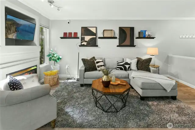 Contemporary living space with designer touches and natural light — steps from your private patio and surrounded by nature.