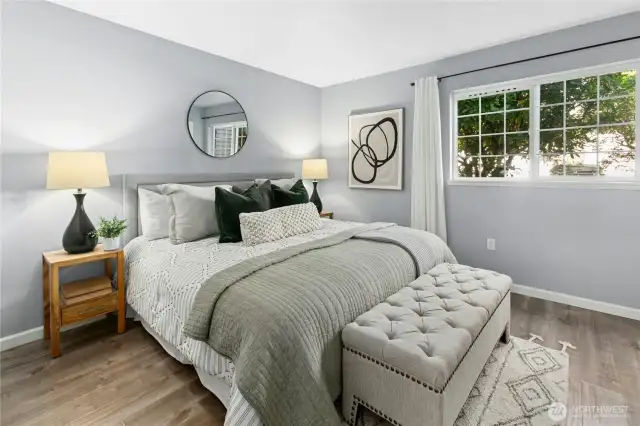 Spacious layout with natural light and a serene, modern color palette.