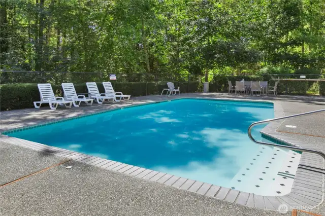 Relax or entertain at the well-maintained outdoor pool surrounded by greenery, reserved for residents of Sundance.