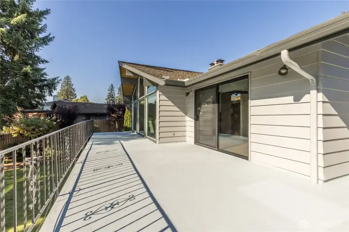 Entertainment-sized deck has plenty of room for lounging, dining and gardening (drip irrigation is already in place!)
