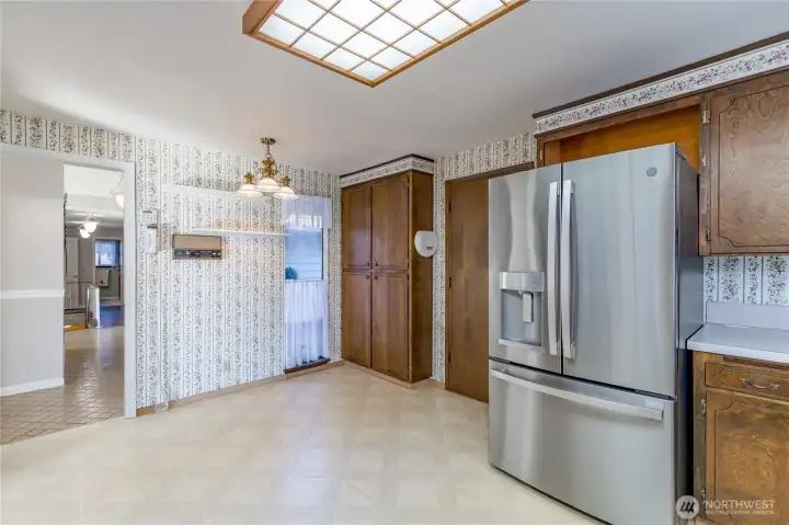 Kitchen connects to the attached 2-car garage