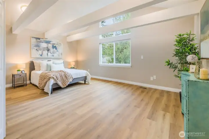 13 foot vaulted ceilings! Natural light and an oasis for the new owner.