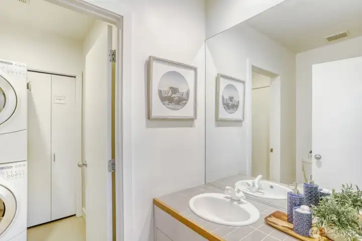 Half Bath downstairs on the main has access to the laundry room.
