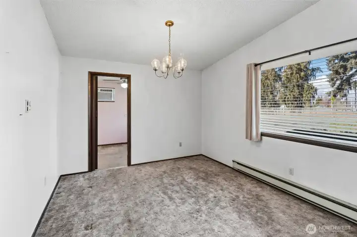 dining area in front of home, open to living room