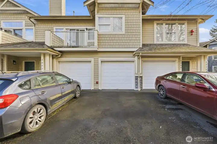 Garage for this unit is in the middle.  Guest parking is just right of unit.