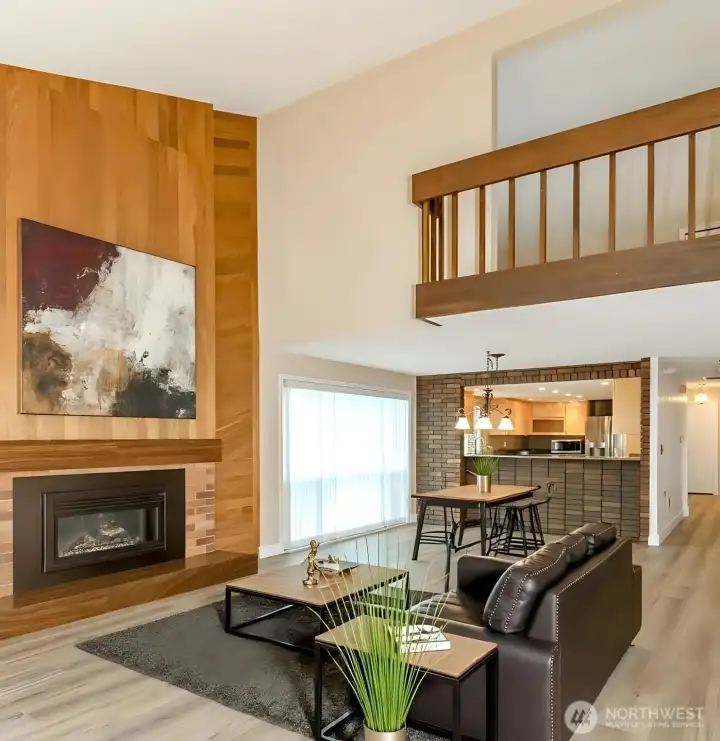 Great room with gas fireplace, virtually staged