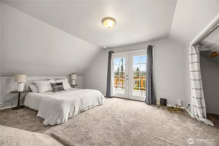 3rd bedroom with balcony access.