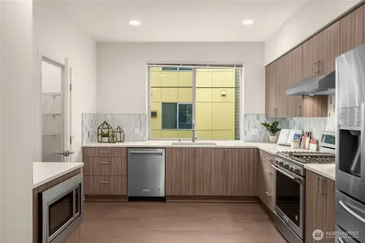 Kitchen with walk-in pantry (staged)