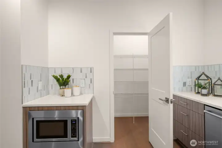 Kitchen with walk-in pantry (staged)